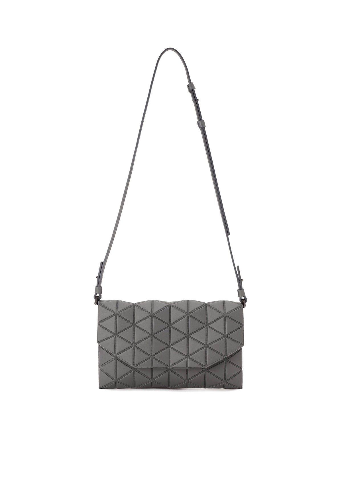 The TONNEAU MATTE by BAO BAO ISSEY MIYAKE is a grey, barrel-shaped shoulder bag with a geometric triangle panel design and a long, slim adjustable strap, shown against a plain white background. view 2 of 6