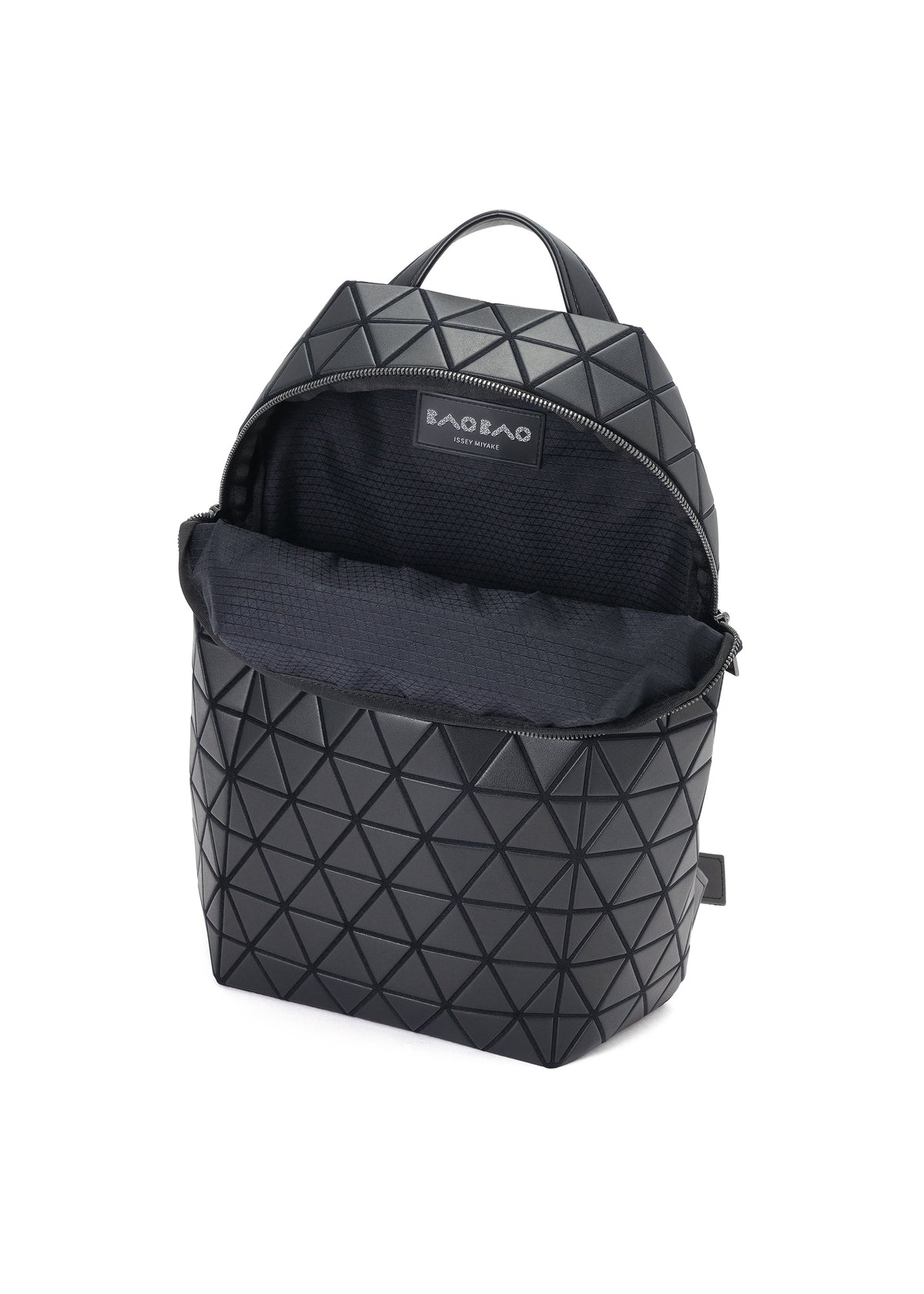 A black geometric-patterned sporty backpack, HEXAGON by BAO BAO ISSEY MIYAKE, with a top handle, unzipped to reveal a spacious interior with three pockets and the brand label inside. view 6 of 7