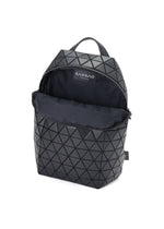 A black geometric-patterned sporty backpack, HEXAGON by BAO BAO ISSEY MIYAKE, with a top handle, unzipped to reveal a spacious interior with three pockets and the brand label inside.