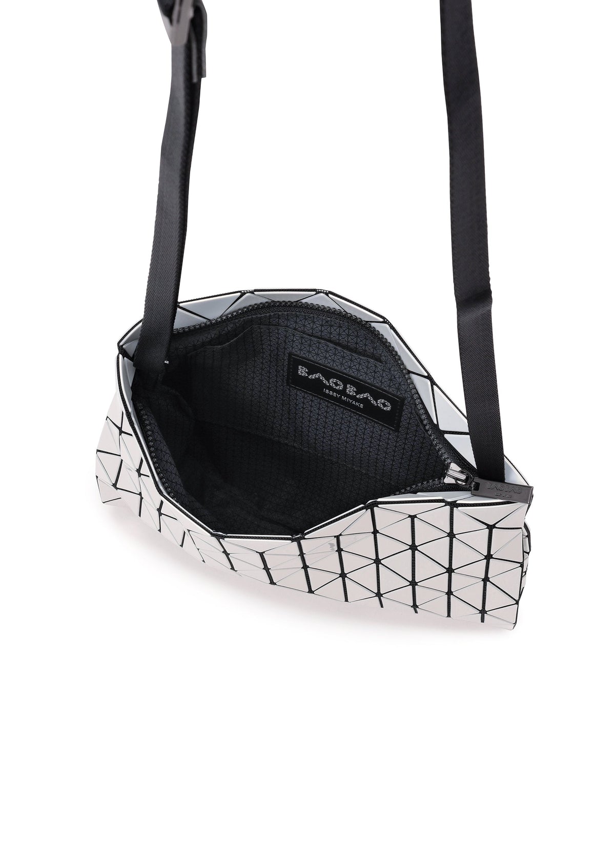 A geometric silver ROW METALLIC shoulder bag from BAO BAO ISSEY MIYAKE, crafted from polarized pearl material with black grid lines, is shown open to reveal its black mesh interior and a visible Bao Bao label. view 6 of 7