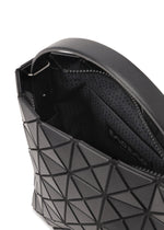 Open black VALLEY handbag by BAO BAO ISSEY MIYAKE with geometric pattern, zippered opening, visible interior lining and label. Features a modern triangular design and stands upright on its base.