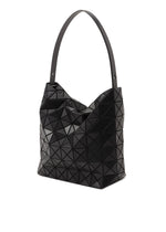 The VALLEY by BAO BAO ISSEY MIYAKE is a black gusseted handbag with a geometric triangular pattern and a wide shoulder strap, shown against a white background.