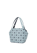 The BOSTON tote by BAO BAO ISSEY MIYAKE features a light blue geometric design with black triangular lines, two wide handles, a structured shape, and modern style for spacious storage.