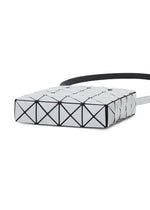 The PRISM GLOSS by BAO BAO ISSEY MIYAKE is a geometric square-shaped shoulder bag from the PRISM series, distinguished by its grid of glossy triangular white panels outlined in black, a sleek black strap, and a strikingly modern, futuristic design.