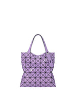 A purple PRISM GLOSS tote bag by BAO BAO ISSEY MIYAKE, crafted with an enamel-like finish and black triangular grid lines, featuring two handles and a contemporary, flexible design. - ORCHID （no.27）