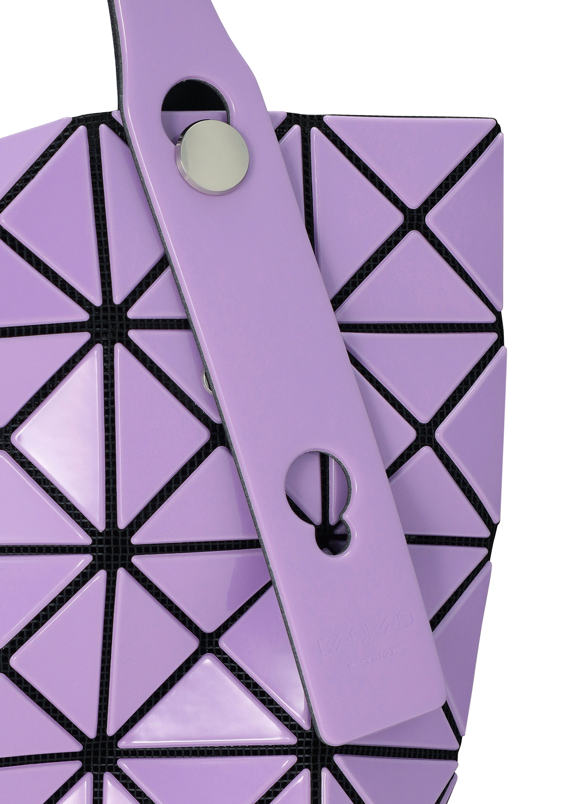 Zoomed view Close-up of the PRISM GLOSS tote bag by BAO BAO ISSEY MIYAKE in lavender, featuring enamel-like triangular panels with black mesh lines. The image also highlights the lavender strap with a round silver button and a keyhole-shaped cutout.