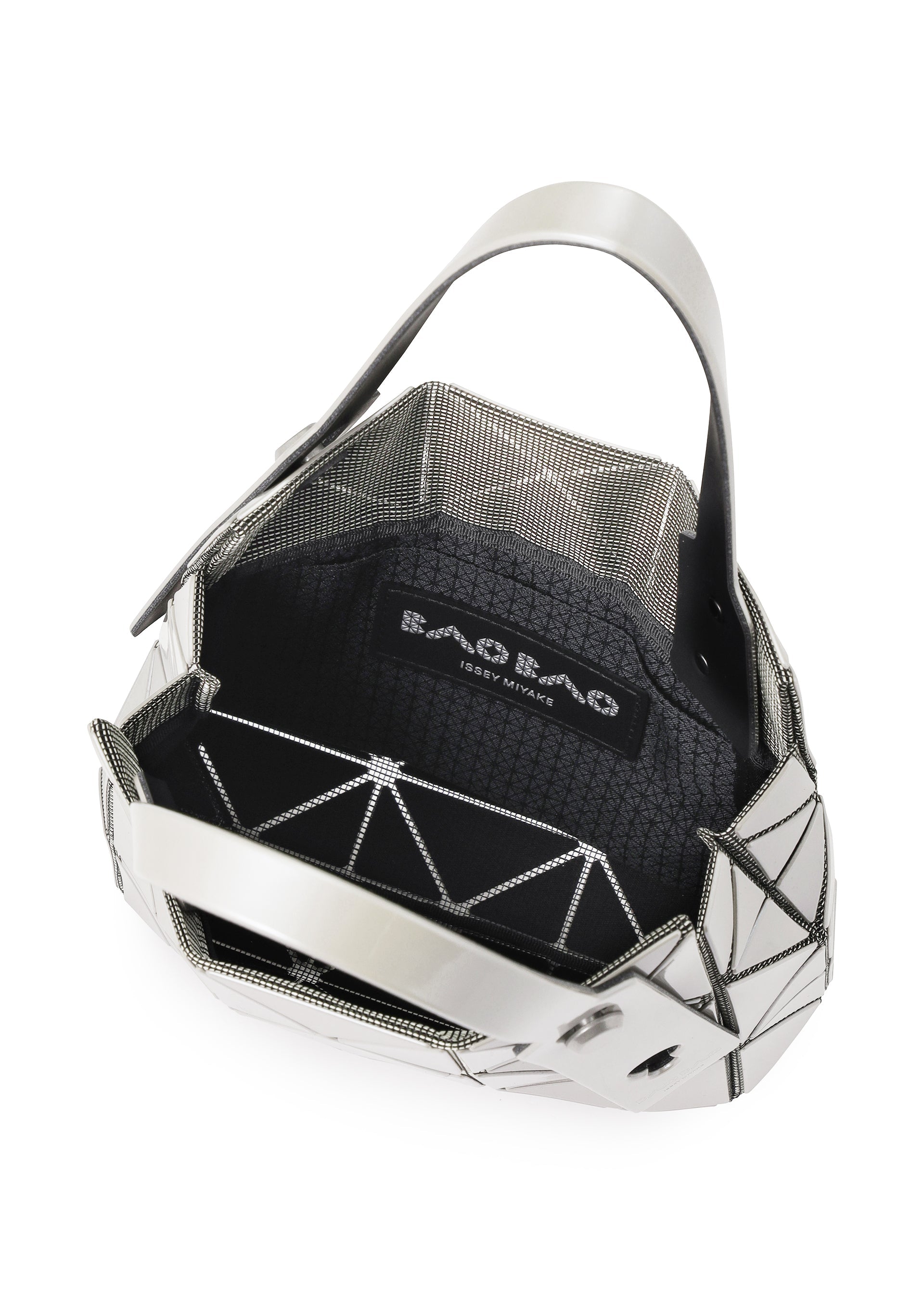 Zoomed view Open CARAT silver geometric handbag with black interior, showcasing the BAO BAO ISSEY MIYAKE logo label inside. Crafted from striking metallic material, this bag features a modern, angular design with a single wide handle and includes an inner pocket for added convenience.