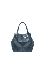 Introducing the CARAT tote bag by BAO BAO ISSEY MIYAKE—a dark blue handbag featuring a striking geometric pattern and glossy metallic finish. This modern, angular design is equipped with two sturdy handles and includes a convenient zippered pocket for secure storage. - OBSIDIAN BLACK （no.19）