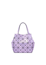 Introducing the CARAT handbag by BAO BAO ISSEY MIYAKE—a lavender geometric bag featuring a distinctive triangular pattern, dual handles, a matching tag attached to one handle, and a practical zippered pocket for added convenience. - PINK AMETHYST （no.20）