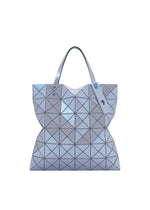 The LUCENT ONE-TONE tote by BAO BAO ISSEY MIYAKE features a geometric triangular pattern in silver-blue enamel, a shiny finish, two top handles, and a modern, structured silhouette. - BLUE GRAY （no.10）