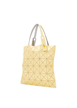 A pale yellow BAO BAO ISSEY MIYAKE LUCENT ONE-TONE tote bag featuring glossy enamel triangular panels in a geometric grid and two handles, shown against a white background.