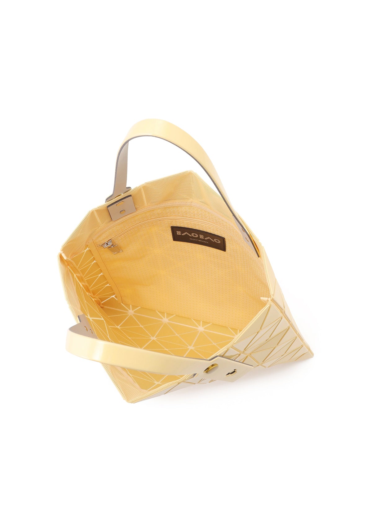 The LUCENT ONE-TONE tote by BAO BAO ISSEY MIYAKE is a geometric yellow bag with white triangles, made from glossy enamel. It has a matching yellow interior, zippered pocket, BAOBAO label, two handles, and a structured design. view 8 of 10