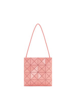 The LUCENT ONE-TONE tote by BAO BAO ISSEY MIYAKE is a pink bag with a geometric triangular pattern and single strap, ideal for everyday essentials, shown against a white background. - SUNSET CORAL （no.31）