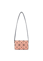 The CUBOID bag by BAO BAO ISSEY MIYAKE features a rectangular, minimalist design with a peach-colored geometric pattern, accented by black outlines and a long adjustable strap, shown against a white background. - CORAL ORANGE （no.30）
