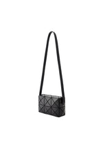 The CUBOID crossbody bag by BAO BAO ISSEY MIYAKE is a black, rectangular bag featuring a geometric triangular pattern and a long adjustable strap, shown here against a white background.