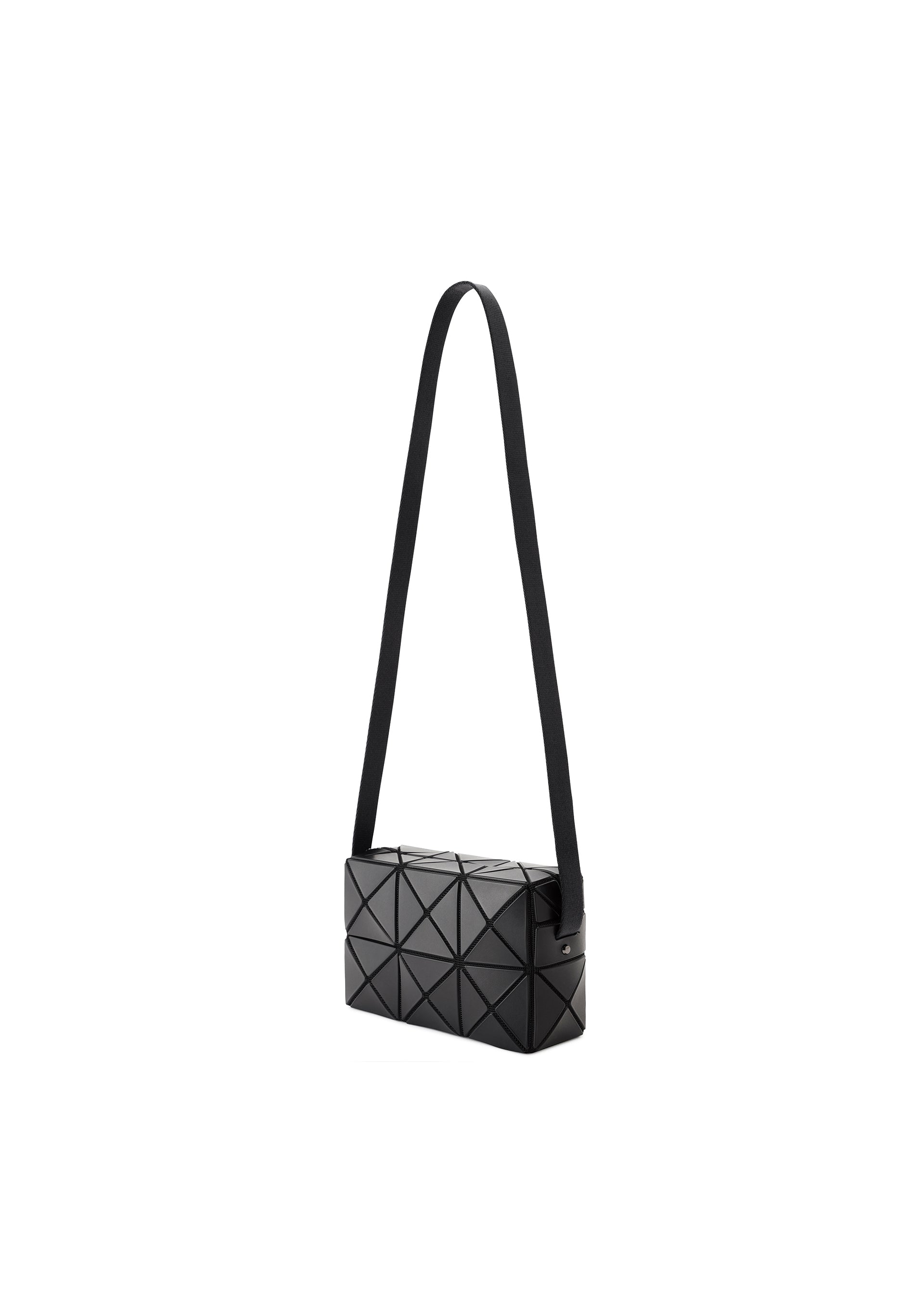 Zoomed view The CUBOID crossbody bag by BAO BAO ISSEY MIYAKE is a black, rectangular bag featuring a geometric triangular pattern and a long adjustable strap, shown here against a white background.