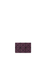 The TWINKLE by BAO BAO ISSEY MIYAKE is a small, dark purple rectangular card case with a geometric pyramid pattern—ideal for lovers of minimalist design. - BURGUNDY （no.85）