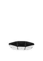 The TWINKLE by BAO BAO ISSEY MIYAKE is a geometric black and white clutch or card case with a flat bottom and triangular pattern, shown on a plain white background.
