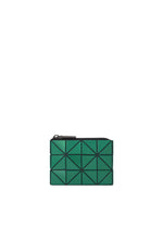The CASSETTE by BAO BAO ISSEY MIYAKE is a small green zippered coin pouch featuring a geometric triangular pattern with black outlines, shown centered on a plain white background. - MALACHITE GREEN （no.67）