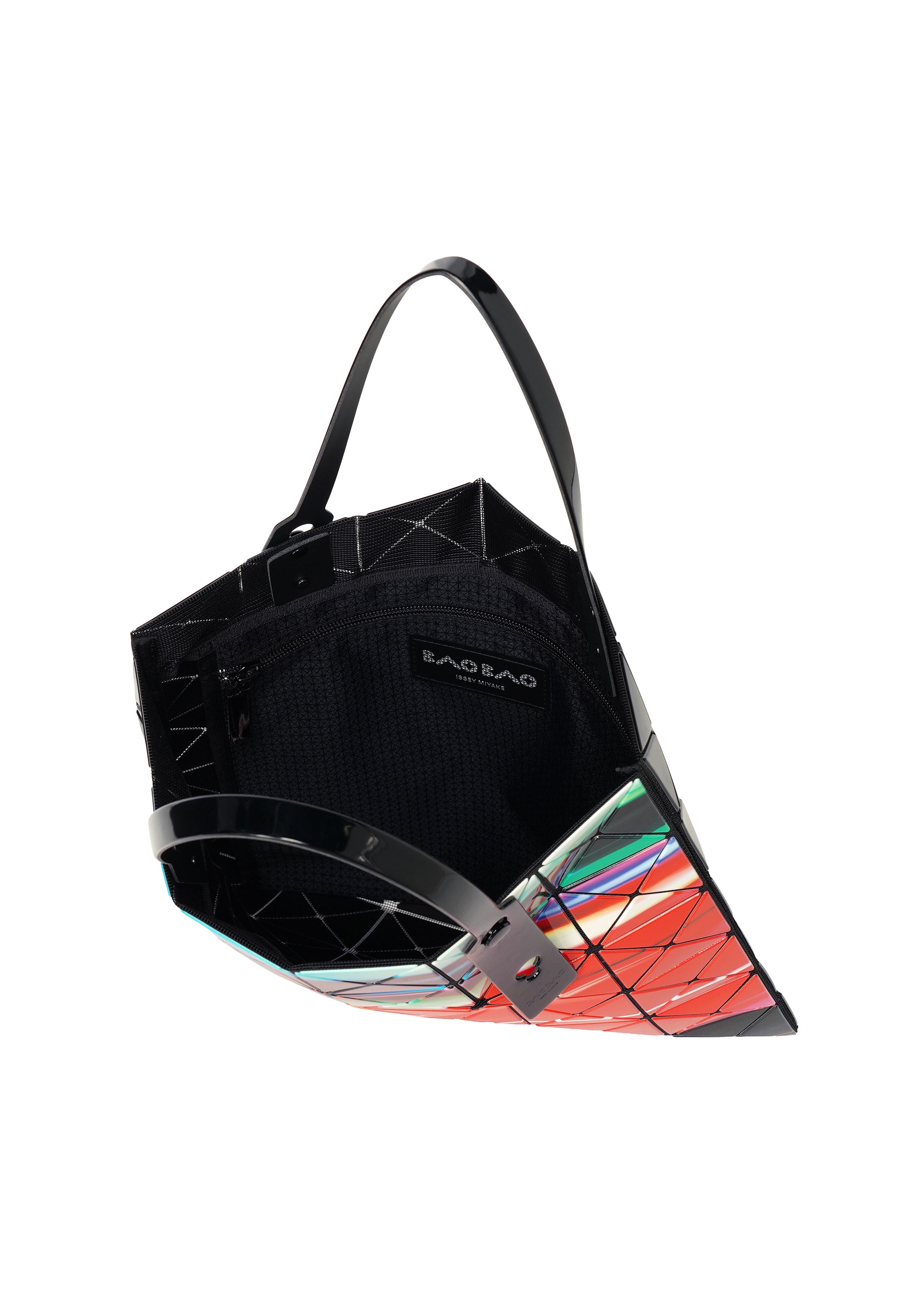 Zoomed view The WARP tote by BAO BAO ISSEY MIYAKE features a geometric pattern with colorful triangular panels, black handles, a black interior, an open top, an interior zip pocket, and a visible brand label.