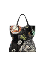 The COSMIC tote bag by BAO BAO ISSEY MIYAKE is a geometric black enamel bag adorned with multicolored abstract patterns, designed with two handles and a glossy, segmented surface—spaciously crafted to easily accommodate your A4-sized documents. - BLACK BASE （no.18）