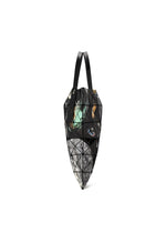 The COSMIC tote bag by BAO BAO ISSEY MIYAKE features a geometric, triangular design with mosaic-like facets in black, combining glossy enamel, matte, and marbled patterns in shades of gray, black, and subtle green accents. It has a short handle and is perfectly sized to carry your A4 documents.