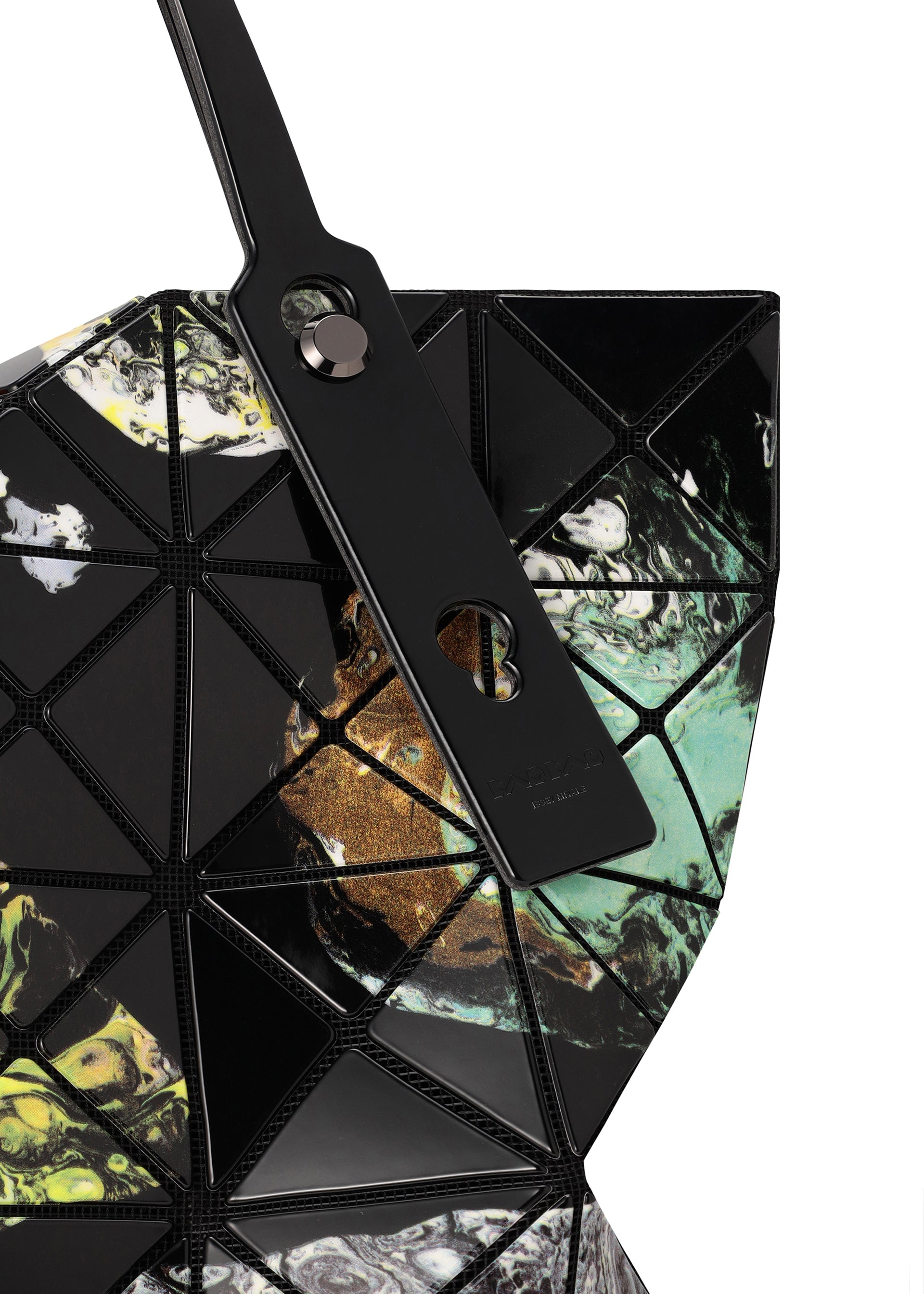 Zoomed view A close-up of the COSMIC tote bag by BAO BAO ISSEY MIYAKE, featuring geometric panels in black, green, yellow, and white marbled enamel with a black strap enhanced by metallic hardware—perfectly sized for carrying your A4-sized documents.