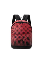 A red DAYPACK GRADUAL from BAO BAO ISSEY MIYAKE featuring a geometric pattern with black accents and padded shoulder straps, distinguished by a striking graphic gradation that enhances its three-dimensional form, is shown standing upright on a white background. - RED （no.24）