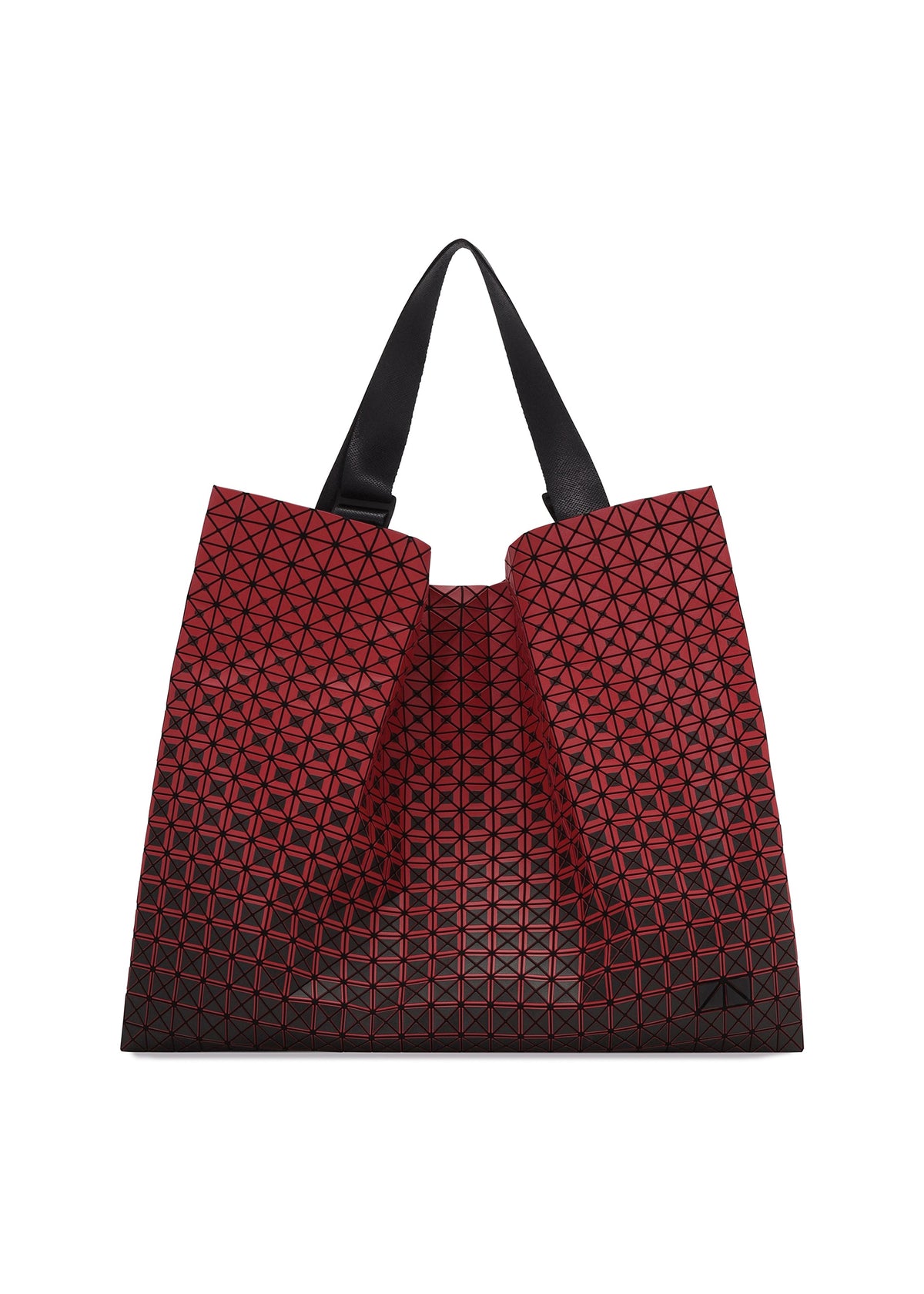 The CART GRADUAL tote by BAO BAO ISSEY MIYAKE features a striking red geometric design with black triangular patterns, complemented by sleek black adjustable handles—an angular, modern accessory perfect for carrying your A4-sized documents in style. view 1 of 8