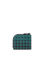 The CLAM WALLET GRADUAL by BAO BAO ISSEY MIYAKE is a compact, square mini wallet featuring a teal and black geometric grid pattern with distinctive triangle shapes and an L-shaped zipper along the top and left sides—making it a stylish choice for carrying coins.