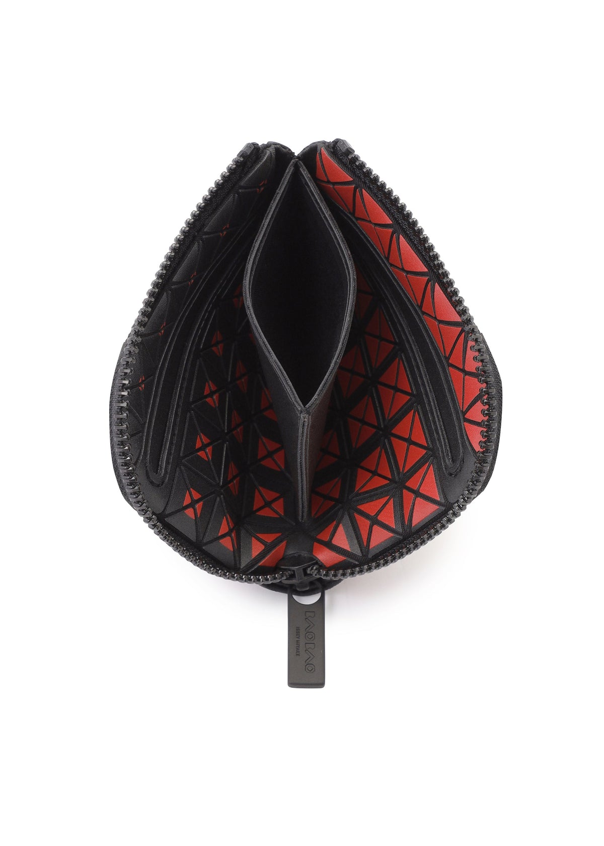 The CLAM WALLET GRADUAL by BAO BAO ISSEY MIYAKE is a black mini wallet seen from above, showcasing an L-shaped zipper that opens to reveal a red geometric patterned interior with multiple compartments for cards and cash, as well as a convenient coin case. view 8 of 8
