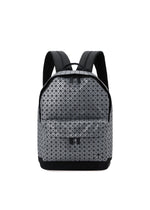 The BAO BAO ISSEY MIYAKE DAYPACK REFLECTOR is a modern 3D backpack with a geometric grey and black triangular pattern, padded shoulder straps, and a front zip pocket, shown on a white background. - GUNMETAL （no.94）