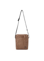 The VOYAGER REFLECTOR by BAO BAO ISSEY MIYAKE is a tan shoulder bag with a black adjustable strap and geometric triangular grid, shown on a white background. The reflective design gives it a modern, stylish look. - COPPER BROWN （no.39）