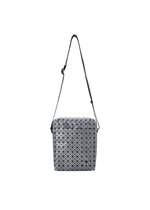 The BAO BAO ISSEY MIYAKE VOYAGER REFLECTOR is a silver reflective tote bag with a geometric pattern and adjustable black strap, shown against a plain white background. - GUNMETAL （no.94）