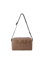 The BAO BAO ISSEY MIYAKE SADDLE BAG REFLECTOR is a metallic, box-shaped bag in copper with a black geometric triangle pattern and strap—a zippered, stylish, and practical accessory against a white background. - COPPER BROWN （no.39）