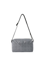 The SADDLE BAG REFLECTOR by BAO BAO ISSEY MIYAKE is a metallic, rectangular bag featuring a geometric triangular pattern, an adjustable black strap, and a monochrome design, shown against a plain white background. - GUNMETAL （no.94）