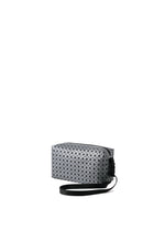 The SADDLE BAG REFLECTOR by BAO BAO ISSEY MIYAKE is a metallic rectangular crossbody bag with a silver geometric pattern and black strap, shown against a plain white background.