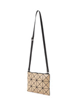 A flat, rectangular BAO BAO ISSEY MIYAKE LUCENT GLOSS crossbody bag made of beige triangular panels connected by a dark grid, with an adjustable black strap.