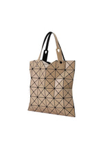 A LUCENT GLOSS tote bag by BAO BAO ISSEY MIYAKE, featuring beige triangular panels in a geometric grid with black outlines and dual handles.