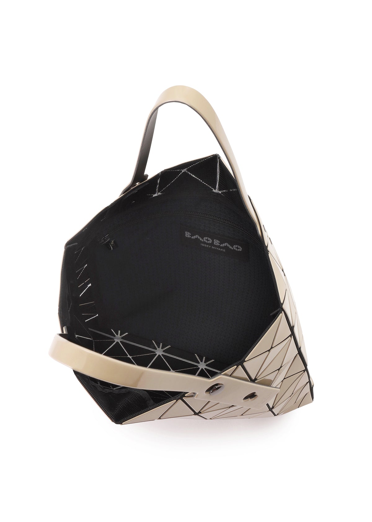 A beige BAO BAO ISSEY MIYAKE LUCENT GLOSS tote bag made of triangular geometric panels, shown from a top-down angle to reveal its black interior lining. view 5 of 6