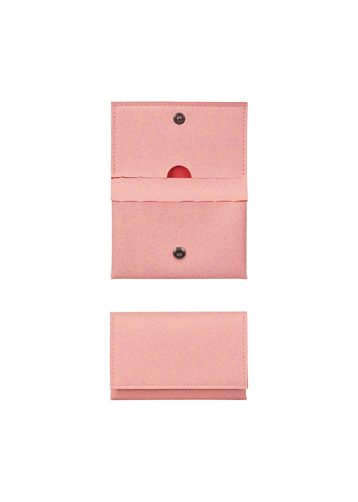 Two views of the PACKAGE card case by GOOD GOODS ISSEY MIYAKE in pink: one open to show its inner pocket and perforated lines, and one closed—both set against a white background. A stylish and thoughtful gift idea. view 2 of 9