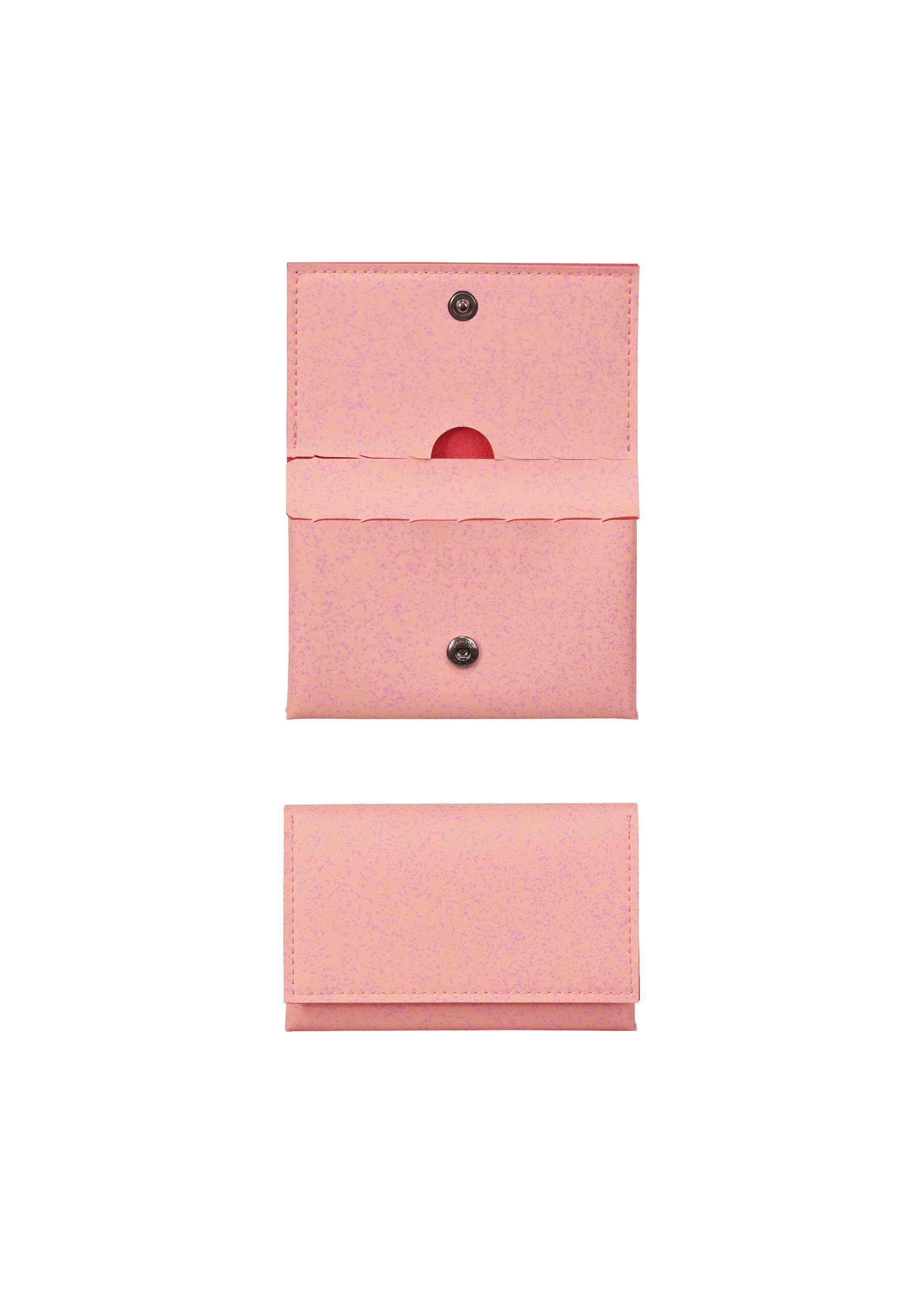 Zoomed view Two views of the PACKAGE card case by GOOD GOODS ISSEY MIYAKE in pink: one open to show its inner pocket and perforated lines, and one closed—both set against a white background. A stylish and thoughtful gift idea. - PINK （no.22）