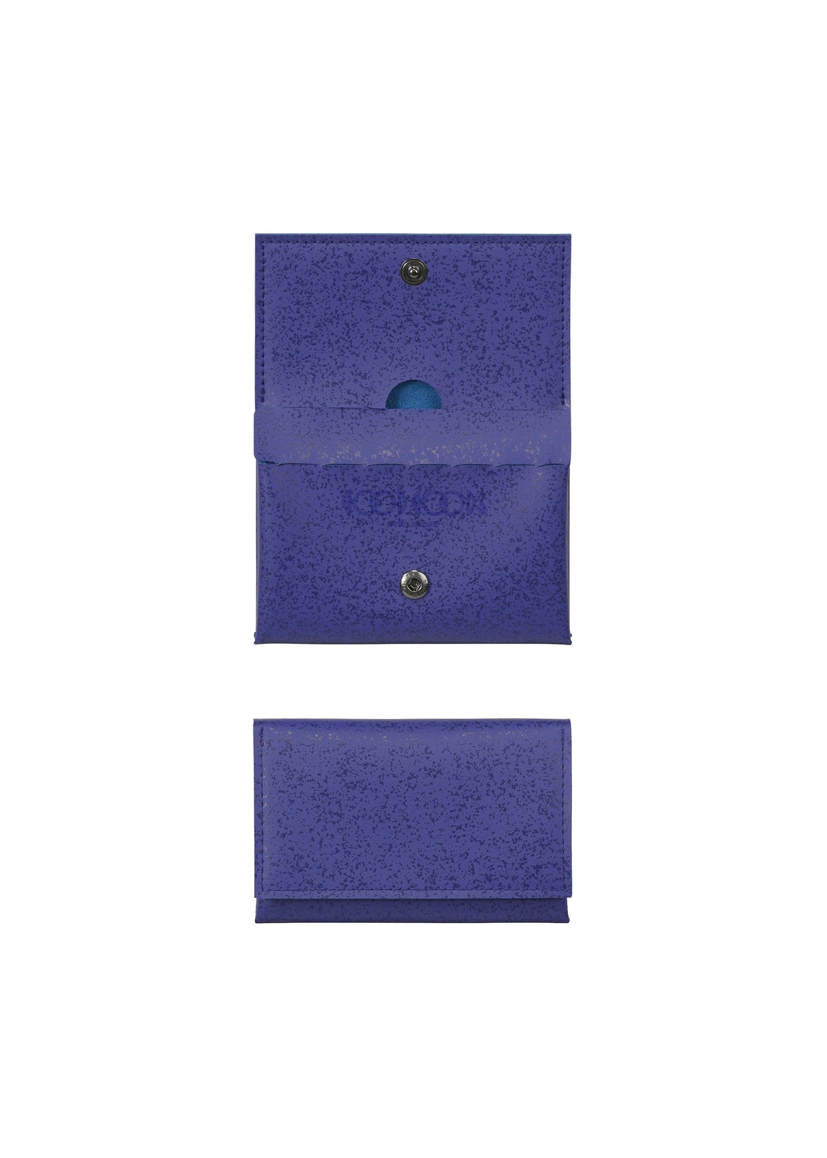 The PACKAGE card case by GOOD GOODS ISSEY MIYAKE is shown open at the top and closed at the bottom; its snap button closure, perforated lines, and an item inside make it a distinctive and stylish gift choice. view 4 of 9