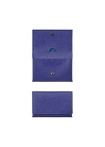 The PACKAGE card case by GOOD GOODS ISSEY MIYAKE is shown open at the top and closed at the bottom; its snap button closure, perforated lines, and an item inside make it a distinctive and stylish gift choice. - BLUE （no.72）