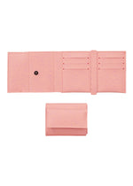 The PACKAGE by GOOD GOODS ISSEY MIYAKE is a pink tri-fold mini wallet, open to reveal card slots and a snap button pocket with a stylish print—compact and gift-ready. - PINK （no.22）