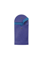 The PACKAGE by GOOD GOODS ISSEY MIYAKE is a purple eyeglass pochette with a rounded top, snap closure, and blue strap, shown open on a white background—perfect as a charming gift.