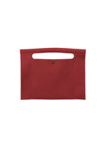 The KURURI by GOOD GOODS ISSEY MIYAKE is a flat red felt bag with a minimalist design, featuring an integrated top handle cutout and a front snap button closure. - RED （no.24）