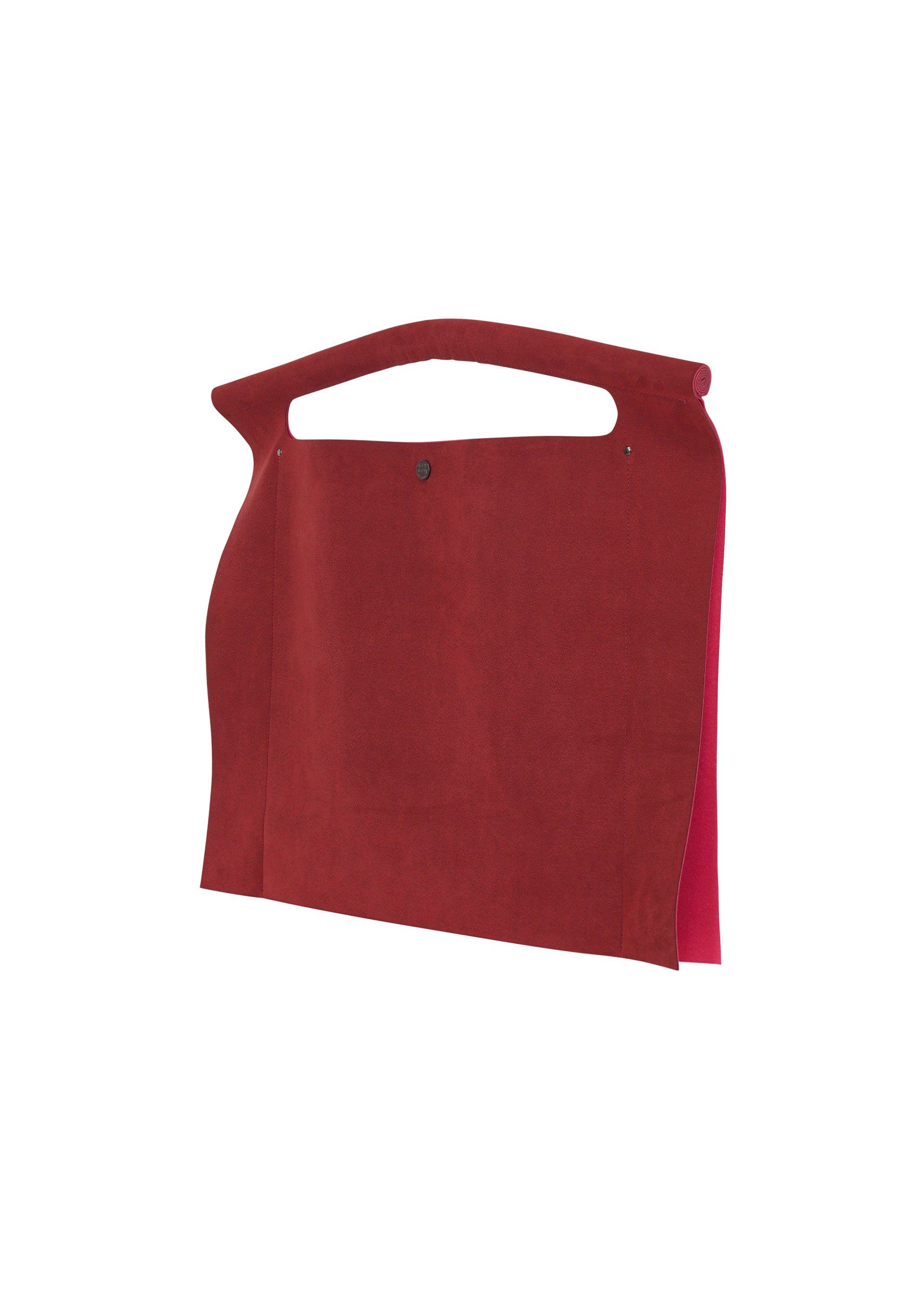 Zoomed view The KURURI by GOOD GOODS ISSEY MIYAKE is a minimalist flat red suede handbag featuring a sturdy handle and snap closure, shown against a white background.