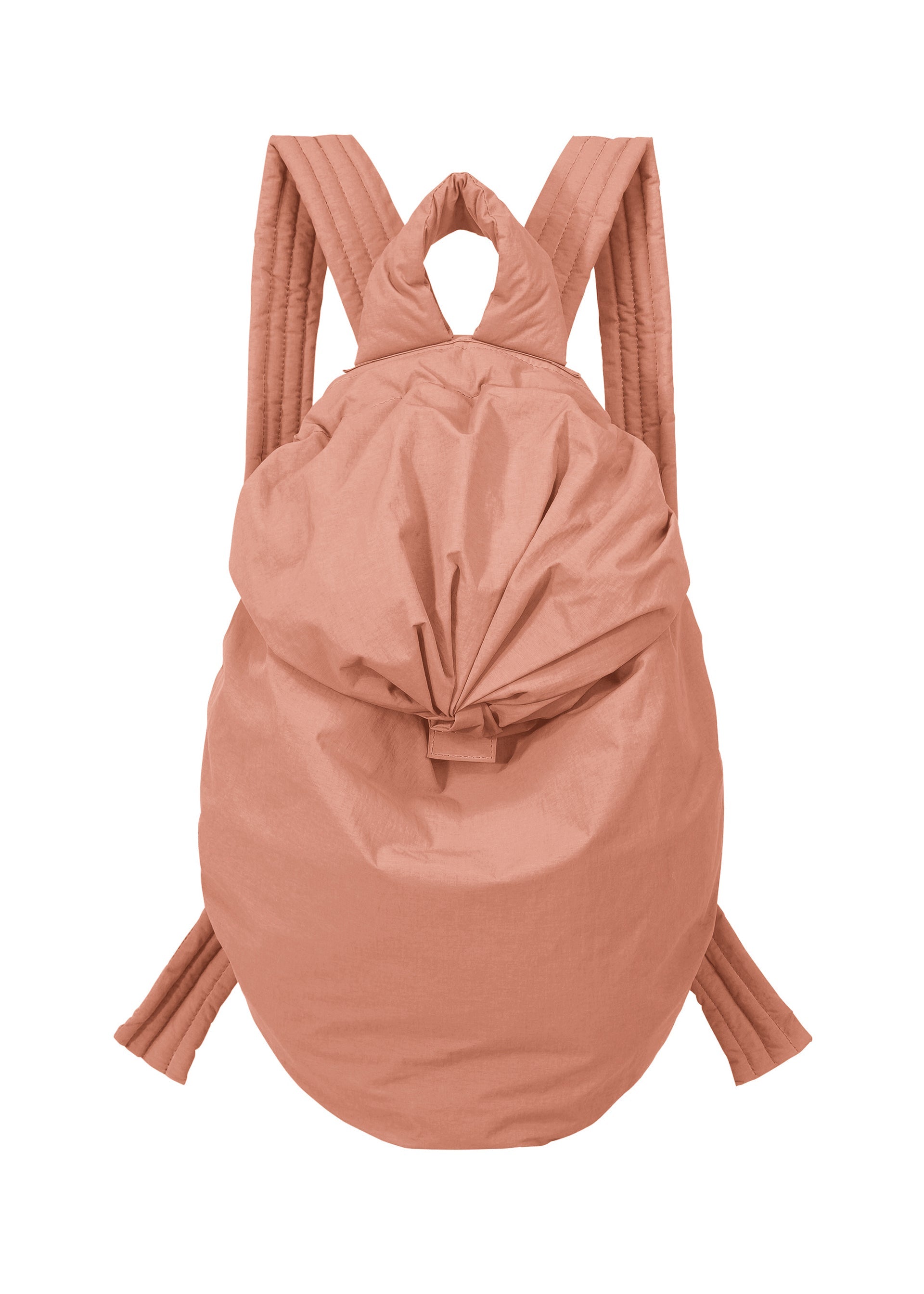 Zoomed view The FUWA FUWA backpack by GOOD GOODS ISSEY MIYAKE is peach-colored and oval-shaped, featuring wide padded shoulder straps and a top knot detail, shown against a white background. - DUSTY PINK （no.28）