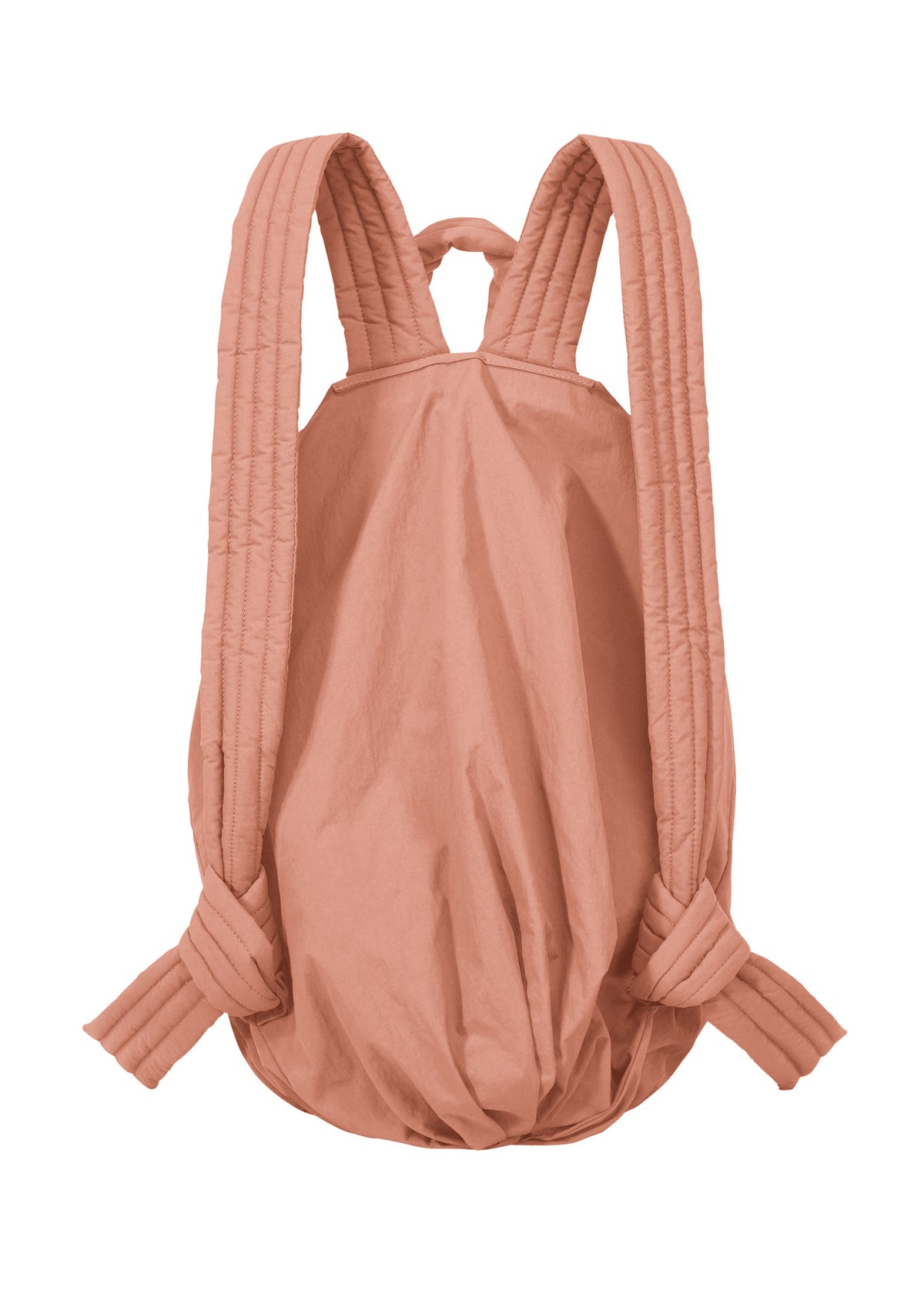 The FUWA FUWA backpack by GOOD GOODS ISSEY MIYAKE is a soft, peach-colored bag with wide padded straps and knotted ends, shown from the back against a white background. view 2 of 6